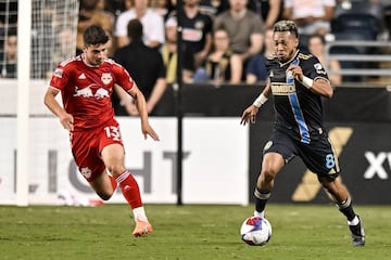 Philadelphia Union midfielder José Andrés Martínez (8) moves the ball past New York Red Bulls forward Dante Vanzeir (13) during the second half of the MLS Leagues Cup round of 16 match at Subaru Park. 